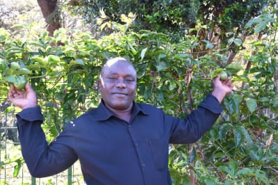 Frances Mutuku Kikuvi of New Kyambondo SHG on his farm
