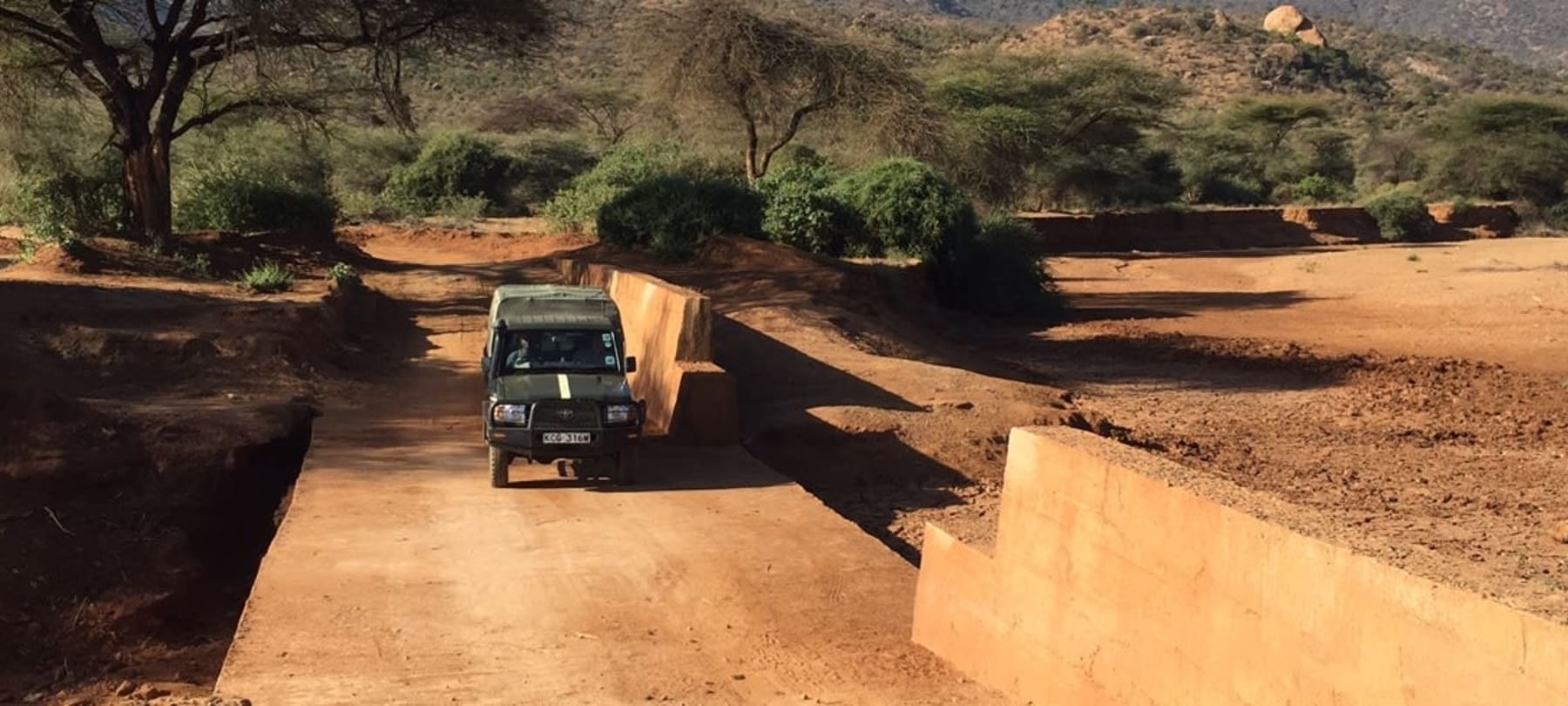 A sand dam road crossing provides water – and bridges a divide between communities